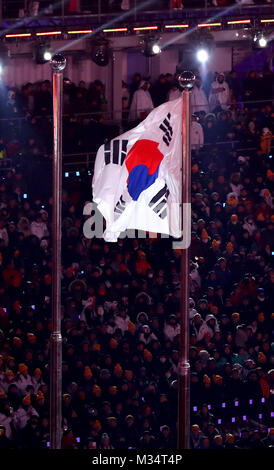 Pyeongchang, South Korea. 9th Feb, 2018. South Korea's flag is raised up at the opening ceremony of the 2018 Winter Olympics in Pyeongchang, South Korea, 9 February 2018. Credit: Daniel Karmann/dpa/Alamy Live News Stock Photo