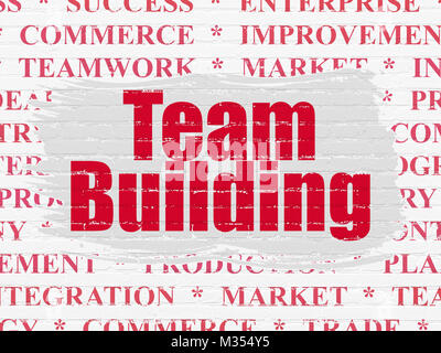 Finance concept: Team Building on wall background Stock Photo