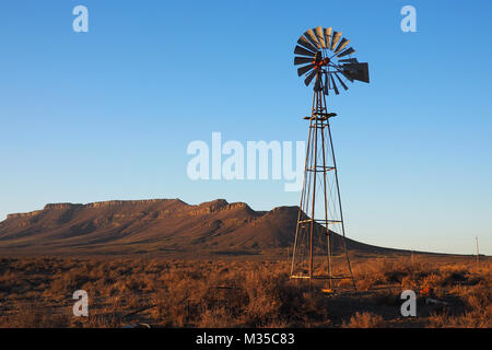 Old Windmill on a farm in South Africa Stock Photo