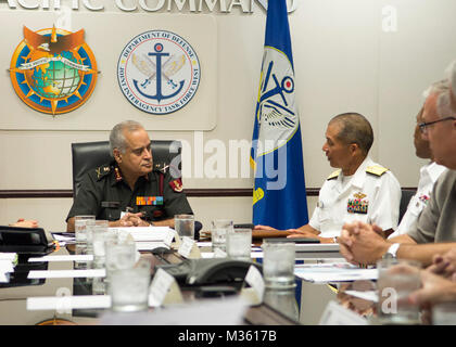 150728-N-DX698-010 CAMP H.M. SMITH, Hawaii (July 28, 2015) Lt. Gen. BK Chopra, Indian Director General Armed Forces Medical Services, left, Rear Adm. Colin G. Chen, command surgeon of U.S. Pacific Command (USPACOM) and staff members discuss the cooperation between U.S. medical units and India medical force. This is the first India official to visit USPACOM to build relationships and explore future health engagements. (U.S. Navy photo by Mass Communication Specialist 1st Class Jay M. Chu/Released) Indian Director General Armed Forces Medical Services Visits PACOM by #PACOM Stock Photo