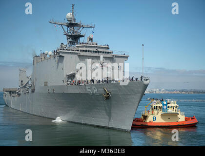 SAN DIEGO (July 7, 2016) The amphibious dock landing ship USS Pearl Harbor (LSD 52) departs Naval Base San Diego en route to take part in the Southern California portion of the Rim of the Pacific (RIMPAC) 2016 exercise. Twenty-six nations, more than 40 ships and submarines, more than 200 aircraft and 25,000 personnel are participating in RIMPAC from June 30 to Aug. 4, in and around the Hawaiian Islands and Southern California. The world's largest international maritime exercise, RIMPAC provides a unique training opportunity that helps participants foster and sustain the cooperative relationshi Stock Photo