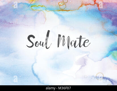 The words Soul Mate concept and theme written in black ink on a colorful painted watercolor background. Stock Photo