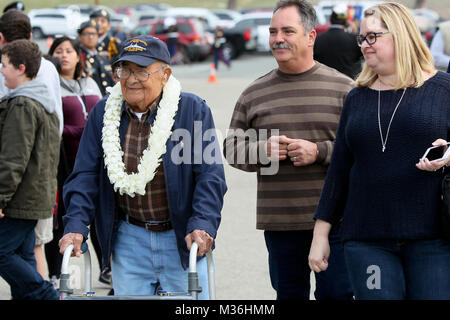 161207-N-HW977-013 NORCO, Calif. (Dec. 7, 2016) Pearl Harbor survivor Roger Marron, left, arrives before the 10th Annual Pearl Harbor Remembrance event at Naval Weapons Station Seal Beach (NWSSB) Detachment Norco. Held near the historic Lake Norconian Conference Center, the event marks the 75th anniversary of the Japanese attack on Pearl Harbor and 75 years of Navy presence in Riverside County, first as a naval hospital serving the wounded from Pearl Harbor, and currently as the Navy's independent assessment agent. (U.S. Navy photo by Greg Vojtko/Released) 161207-N-HW977-013 by NAVSEA Corona Stock Photo