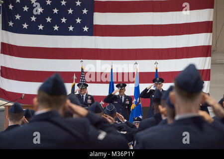 U.S. Air Force Chief of Staff Gen. David L. Goldfein, General Hawk Carlisle, former commander, Air Combat Command, and Gen. James M. Holmes, Commander, ACC, salute during ACC’s Change of Command ceremony at Joint Base Langley-Eustis, Va., March 10, 2017. Holmes assumed command from Carlisle, who retired after 39 years of service to the Air Force. (U.S. Air Force photo by Staff Sgt. Nick Wilson) 170310-F-EA289-002 by AirmanMagazine Stock Photo