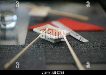 Red chili sauce at Chinese restaurant in Naples Italy Stock Photo