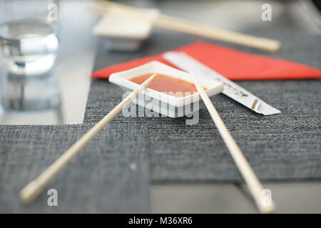 Red chili sauce at Chinese restaurant in Naples Italy Stock Photo