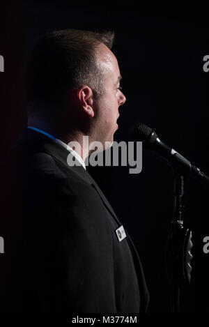 MORGANTOWN, W.Va. (April 18 2017) Musician 1st Class Michael Webb, emcee for the Sea Chanters chorus, speaks to the audience during a performance at the Metropolitan Theatre in Morgantown. The Sea Chanters are on a 21-day tour of the midwestern United States connecting communities across the United States to their Navy. (U.S. Navy photo by Musician 1st Class Sarah Blecker/Released) 170418-N-WV624-182 by United States Navy Band Stock Photo