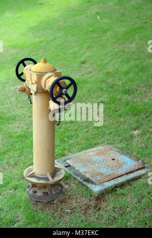 Close up of yellow water hydrant sign, UK Stock Photo - Alamy