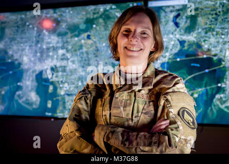 Maj. Jennifer Snow, a Donovan Group innovation officer with the U.S. Special Operations Command poses for a photo at SOFWERX headquarters in Ybor City, Tampa, Florida. Snow and the Donovan group are a dedicated future studies team that falls under the strategy, plans and programs directorate.  They are a small, roughly 10-member group includes a combination of Navy SEALs, Army rangers and a variety of intelligence officers. Together they focus on developing future-oriented ideas to inform government agencies and private industry fellows on ways to stay ahead of the competition in the areas of  Stock Photo