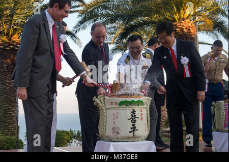 170519-N-NT265-657 SHIMODA, Japan (May 19, 2017) – Capt. Jeffrey Kim, center right, commander, Fleet Activities Yokosuka, participates in a sake barrel cracking ceremony during a reception in Shimoda, Japan, as part of the Shimoda Black Ship Festival. The Navy’s participation in the festival celebrates the heritage of U.S.-Japanese naval partnership first established by commodore Matthew Perry’s 1853 port visit. For more than 160 years, the United States has established a heritage of naval presence in the Indo-Asia-Pacific region to promote partnership, prosperity, and maritime security. (U.S. Stock Photo