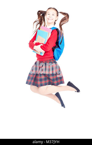 Schoolgirl with books Stock Photo