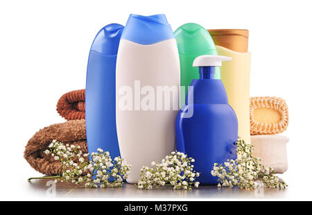 Plastic bottles of body care and beauty products isolated on white Stock Photo