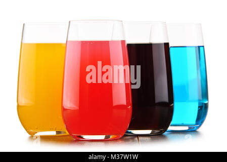 Glasses of assorted carbonated soft drinks isolated on white. Stock Photo