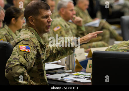 Army Maj. Gen. Todd McCaffrey, commanding general of First Army Division East, speaks to his brigade and division command teams during the First Army Division East Commander's Conference, Aug. 23, 2017 at Fort Knox, Ky. McCaffrey ways in which he would like his observer coach/trainers to 170823-Z-TU749-1035 by First Army Division East Stock Photo