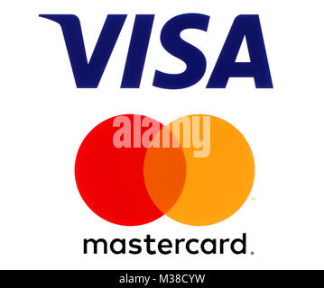 Kiev, Ukraine - September 30, 2017: Visa and Mastercard logos printed on white paper. Visa and Mastercard are an American multinational financial serv Stock Photo