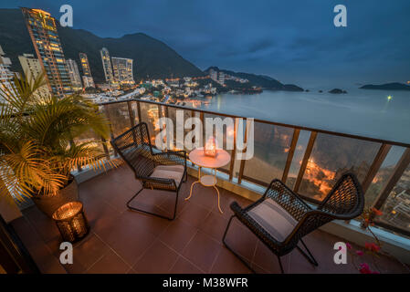 View of Repulse Bay beach in Hong Kong.at nigh from a cosy candle lit balcony. Stock Photo