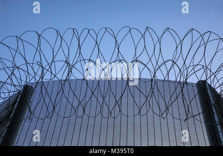 Top of main gate to Shepton Mallet Prison (Somerset UK) now closed and to be redeveloped, but of historical interest with many foreboding features. Stock Photo