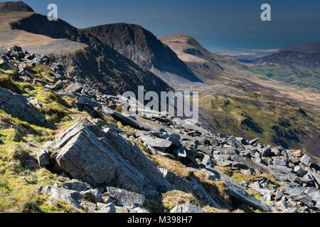 Peak of Penygadair and the northern slopes of Cadair Idris looking to Barmouth Bay, Snowdonia National Park, Gwynedd, North Wales, UK Stock Photo