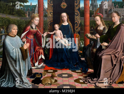 Virgin and Child with Saints and Donor by Gerard David (c.1460-1523), oil on oak panel, c.1510. Gerard David was an early Netherlandish artist and his work is classed as Flemish Primitive. Stock Photo