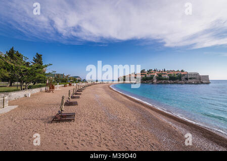 Beach of Sveti Stefan islet and five star Aman Sveti Stefan hotel resort on the Adriatic coast of Montenegro Stock Photo