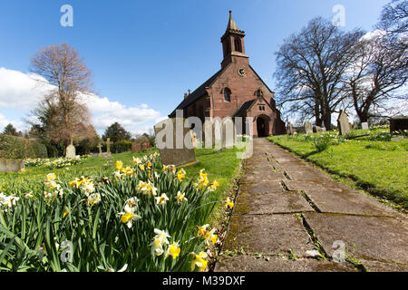 Village of Coddington, England. Picturesque view of the footpath leading to the front of St Mary’s Church, in the Cheshire village of Coddington. Stock Photo