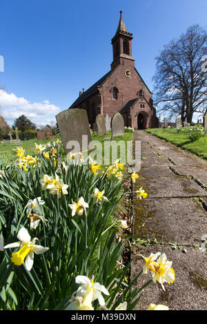 Village of Coddington, England. Picturesque view of the footpath leading to the front of St Mary’s Church, in the Cheshire village of Coddington. Stock Photo