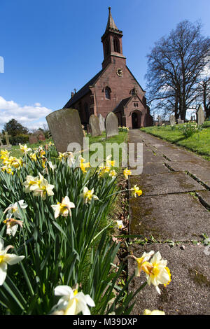 Village of Coddington, England. Picturesque view of the footpath leading to the front of St Mary’s Church, in the Cheshire village of Coddington. Stock Photo