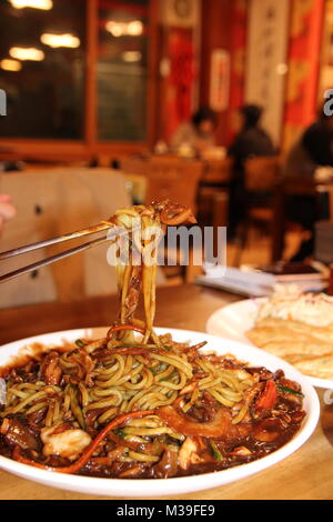 Close up of Jajangmyeon, Korean black bean sauce noodles at Korean restaurant, Busan, South Korea Stock Photo