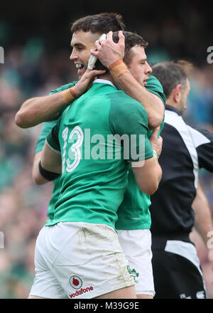 Ireland's Robbie Henshaw (left) celebrates with Conor Murray after scoring his sides first try during the NatWest 6 Nations match at the Aviva Stadium, Dublin. Stock Photo