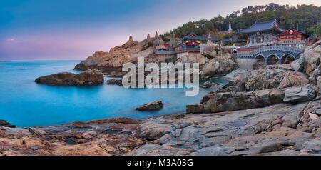 Photo of the temple Haedong Yonggungsa at sunset time Stock Photo