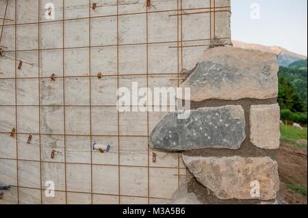 Coating with stones to make aesthetic wall Stock Photo