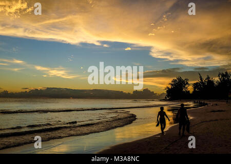 General views of Barbados, Caribbean, walking couple at sunset, beaches on Feb. 1, 2018. Stock Photo