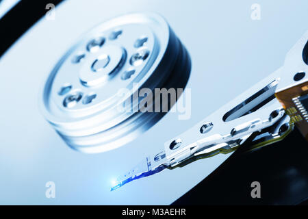 Close up of hard disk with clean surface and working laser head Stock Photo