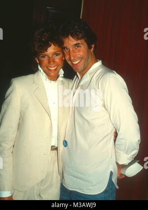 LOS ANGELES, CA - OCTOBER 18: (L-R) Actress Kristy McNichol and actor Henry Winkler attend Nuclear Freeze benefit at Wilshire Ebell Theatre on October 18, 1982 in Los Angeles, California. Photo by Barry King/Alamy Stock Photo Stock Photo