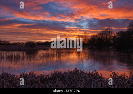 Sunrise over a Lincolnshire Wildlife Trust Nature Reserve, Barton-upon-Humber, North Lincolnshire, UK. 10th February 2018. Stock Photo