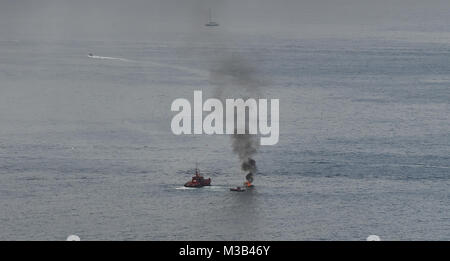 Costa Adeje, Tenerife. 10th Feb, 2018. A boat is seen on fire in Costa Adeje, Tenerife. Credit: Dave Baxter/Alamy Live News. Stock Photo