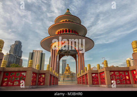 Candles burning a Chinese Buddhist Temple and Pagoda in Bangkok Thaialnd Stock Photo