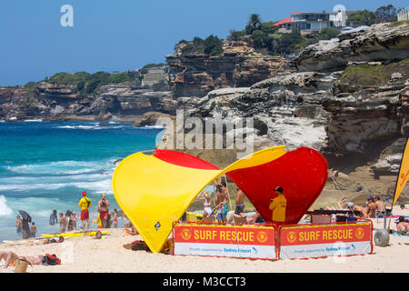 Surf rescue lifeguards on Tamarama beach in Sydney providing volunteer beach rescue services,Sydney Stock Photo