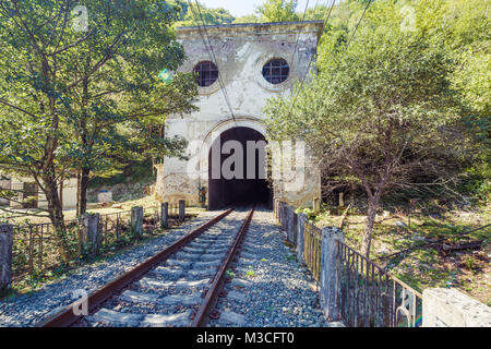 NEW ATHOS, ABKHAZIA, GEORGIA, 19 SEPTEMBER 2017: Rail rails and tunnel near the Psirtskha Railway Station Stock Photo