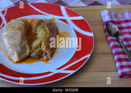 Sarma - vegetable or meat dish of cabbage leaves rolled and stuffed. Included in the cuisines of the Balkans, Central Europe and Middle East Stock Photo