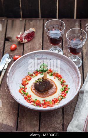 Traditional turkish dish Sultan Choise or Hunkar Begendi - Lamb casserole with eggplant puree with fresh vegs Stock Photo