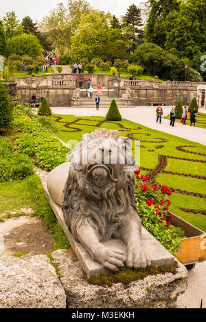 Salzburg, Austria - May 24, 2017: Statue of sad lion looking up, Mirabell gardens (Mirabellgarten). Stock Photo