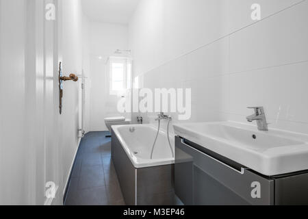 modern bathroom after renovation - white bathroom Stock Photo