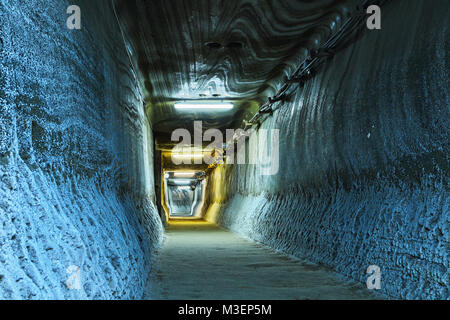 illuminated tunnel in salt mine, blue light Stock Photo