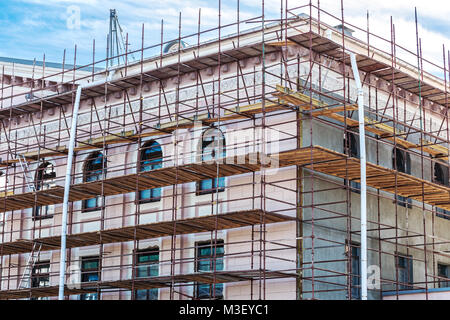 scaffolding on wall of the building for restoration work and renovation of facade Stock Photo