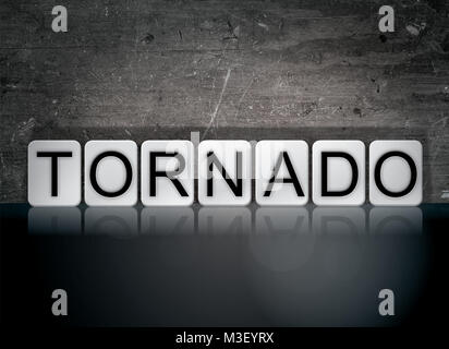 The word Tornado concept and theme written in white tiles on a dark background. Stock Photo