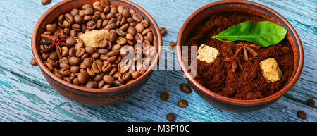 Roasted and ground coffee in bowls. Coffee assortment Stock Photo