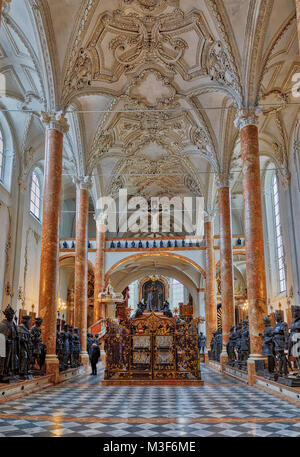 INNSBRUCK, AUSTRIA - JANUARY 28: (EDITORS NOTE: This HDR image has been digitally composited.) The Hofkirche (Court Church) is seen from inside on January 28, 2018 in Innsbruck, Austria. The Court Church is also known by locals as “Schwarzmander Church” thanks to the 28 life-size bronze figures that stand guard, watching over the tomb of Emperor Maximilian I. Stock Photo