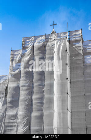 Scaffold construction to renovate church tower building Stock Photo