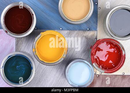 Colorful paint cans top view Stock Photo